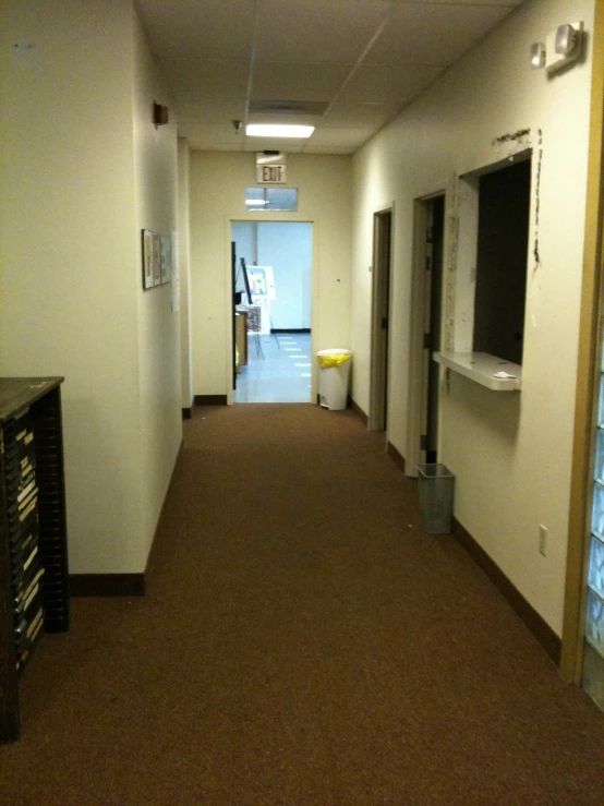 the hallway is empty and needs to be cleaned