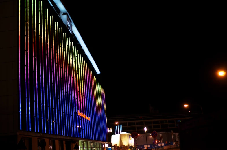 the illuminated facade of a modern office building