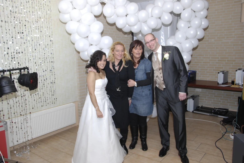 the bride and groom are posing for a po