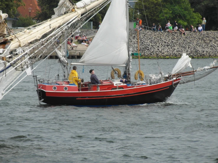 a group of people riding on the front of a boat