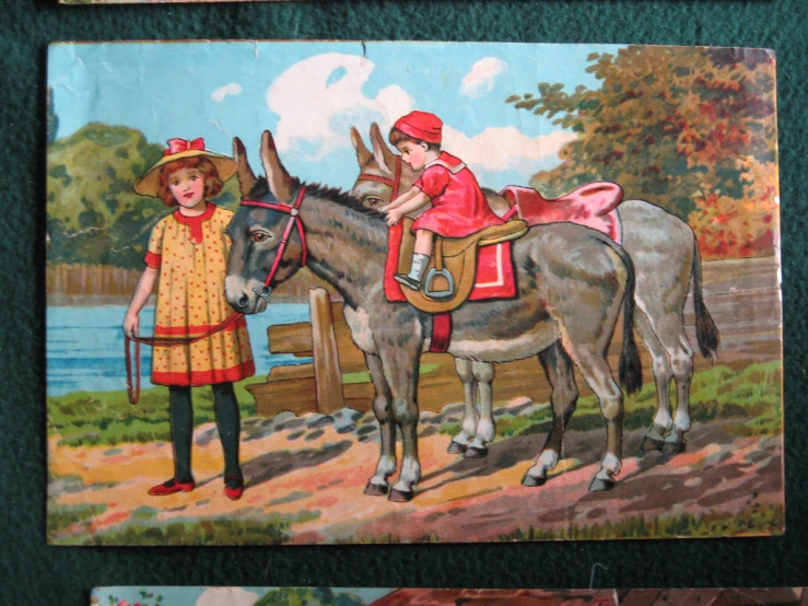 a small children's picture on a paper with children riding a horse