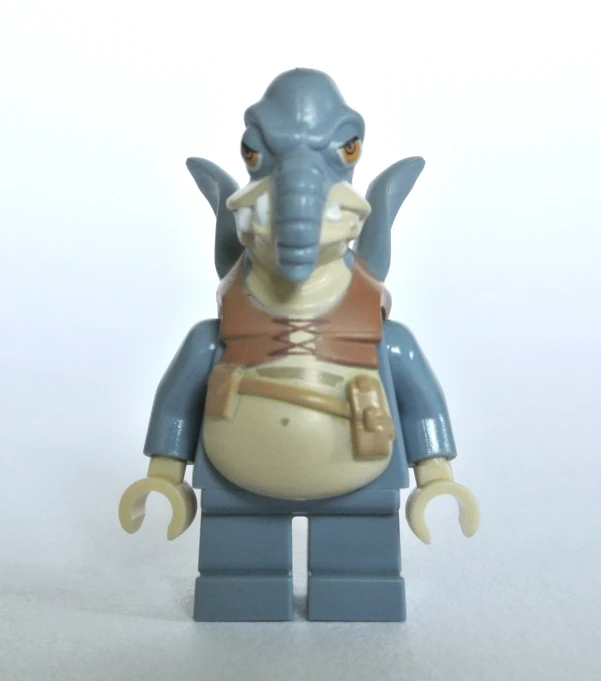 the action figure has an elephant face and brown vest