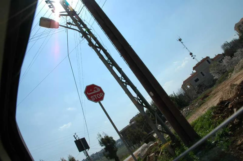 a stop sign on the side of a road