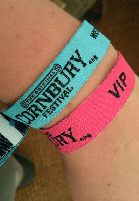 there are two wristbands that have the names on them