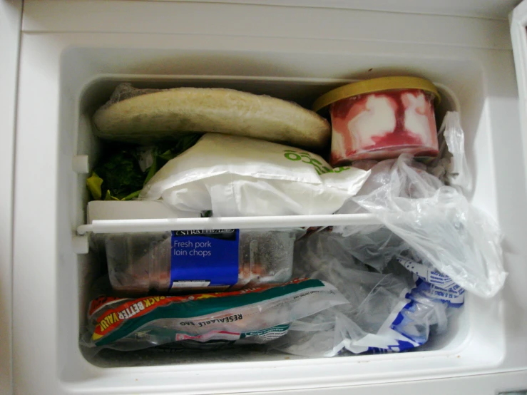 there are several items in this refrigerator including a sandwich