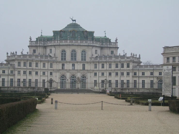 a very large mansion sitting in a park