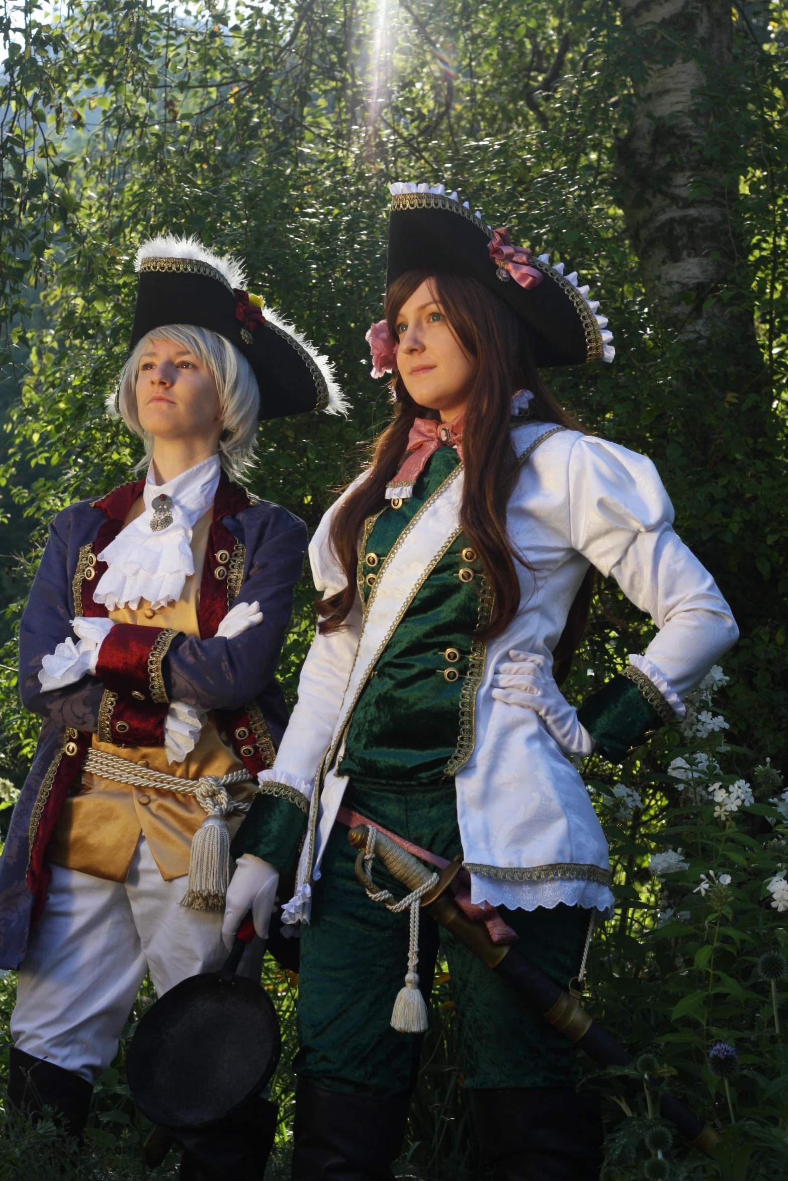 two women in costumes in some flowers