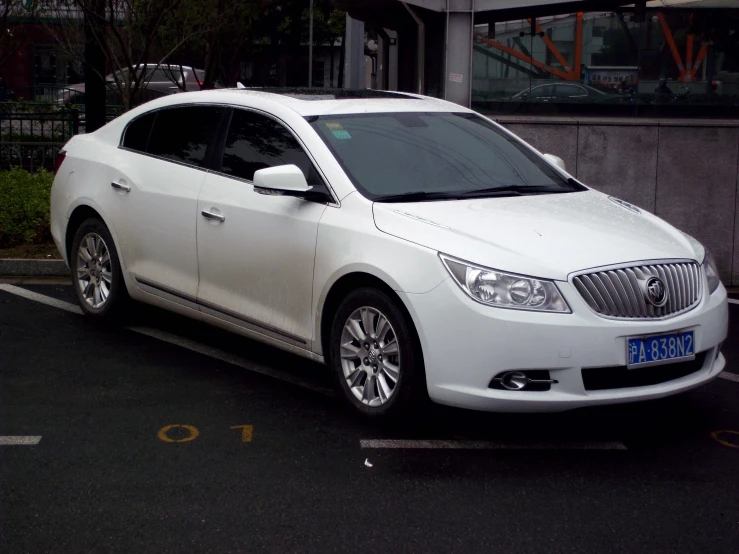 a white car parked on the side of the road