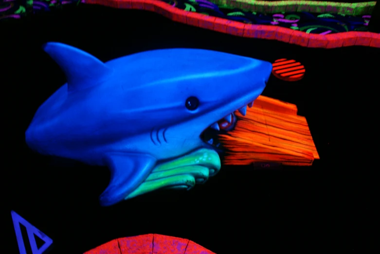 an interactive display of a shark is in the dark