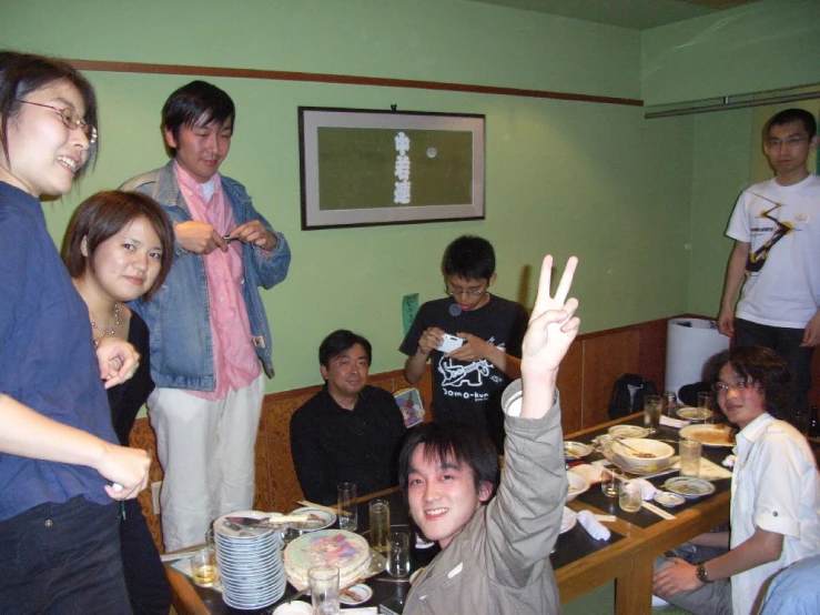 a group of people eating at a table