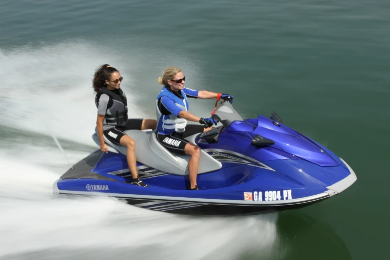 two women on a jet ski