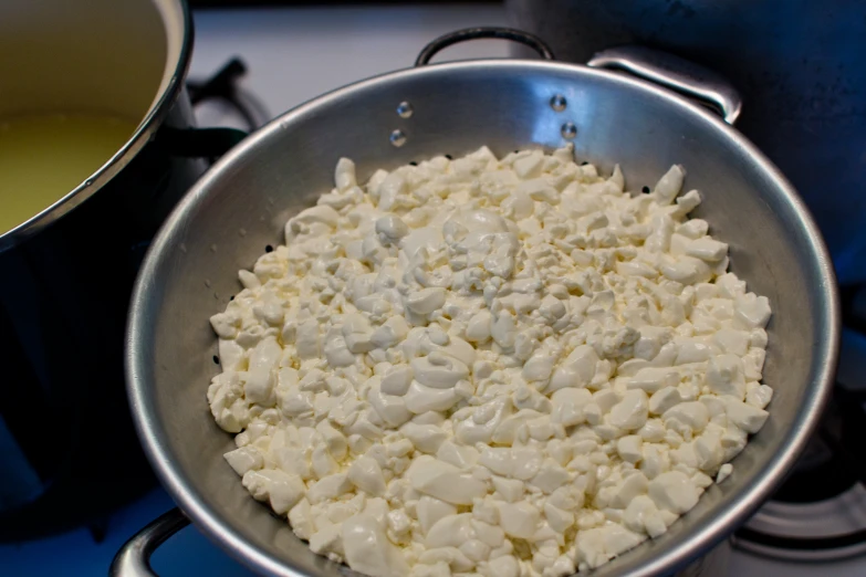 food inside a pot on a stove top