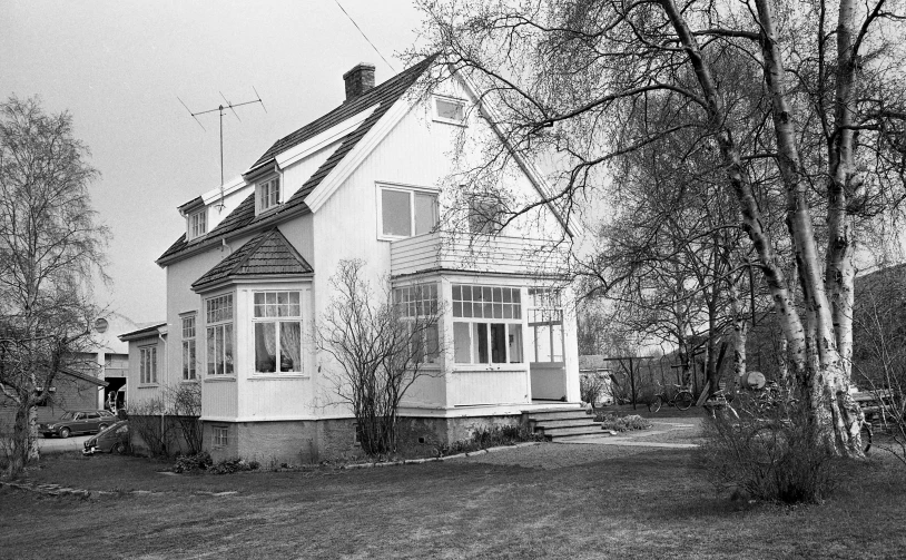 a house on the corner of a street