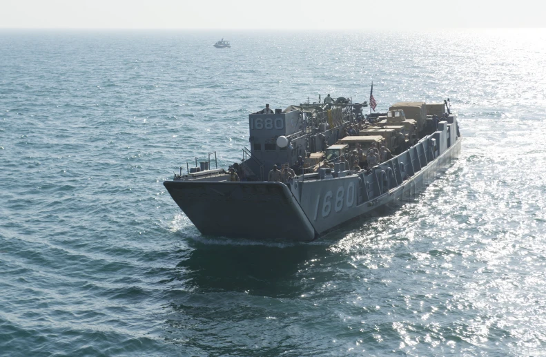 a large cargo boat sailing through the water