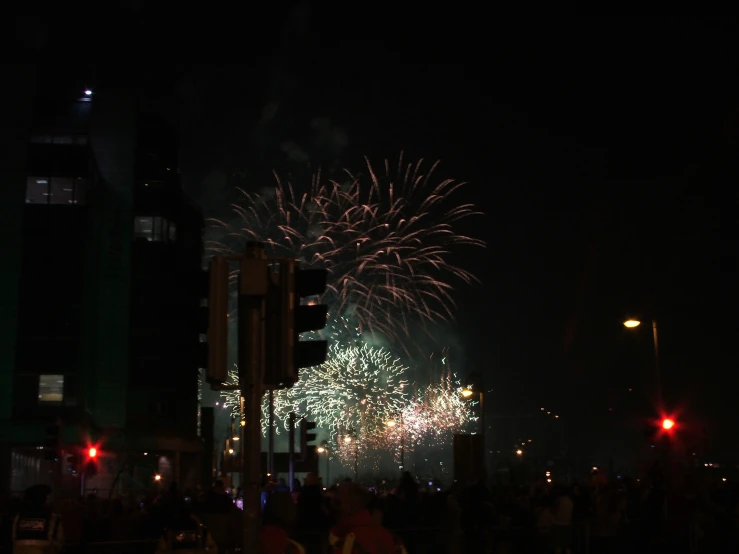 a very big pretty fireworks on a city street