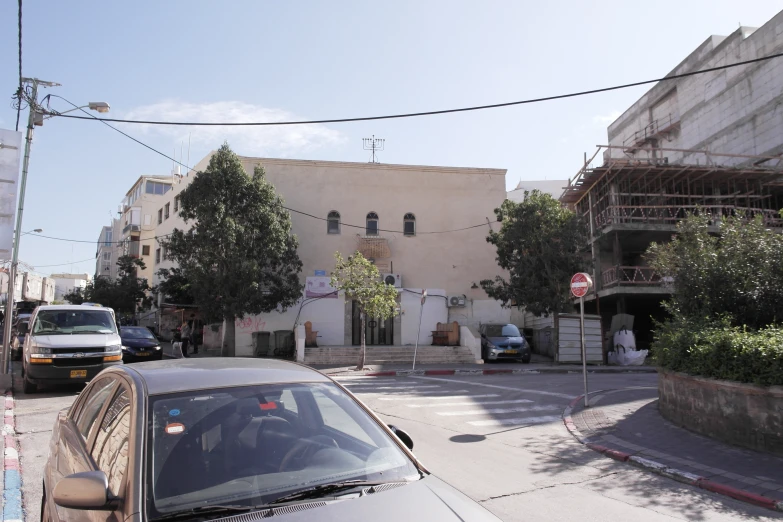 a building that has a car in front of it