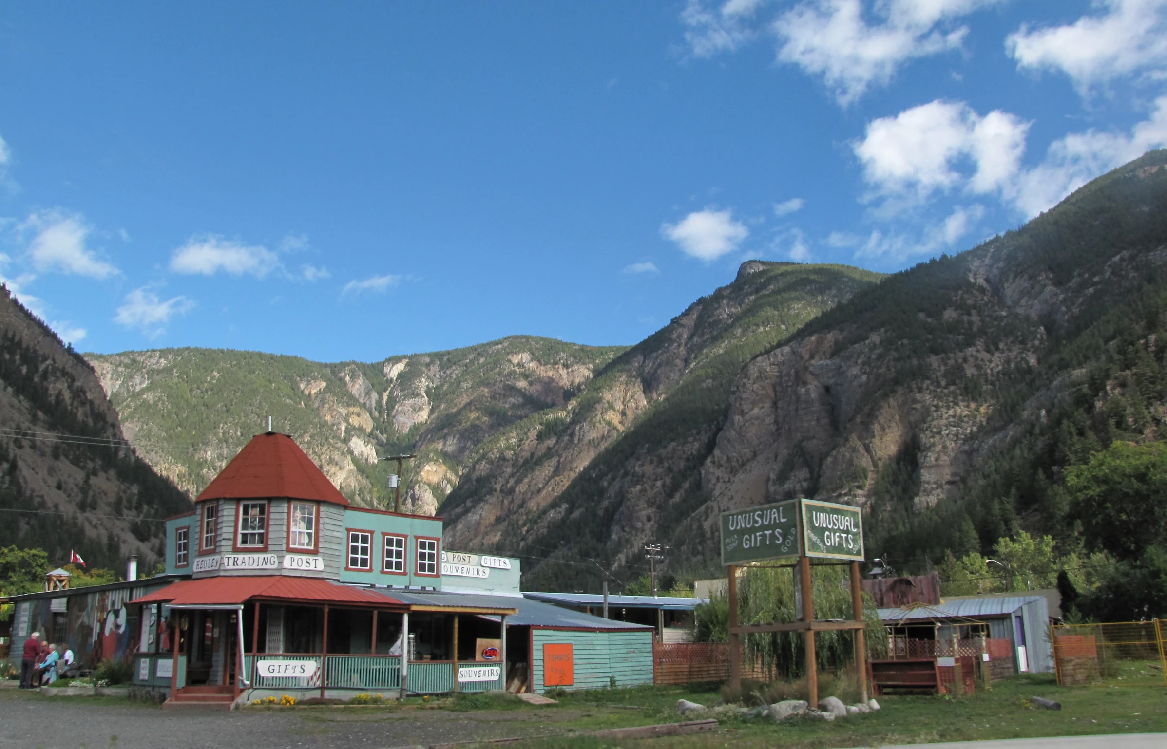 some mountains with some buildings and signs