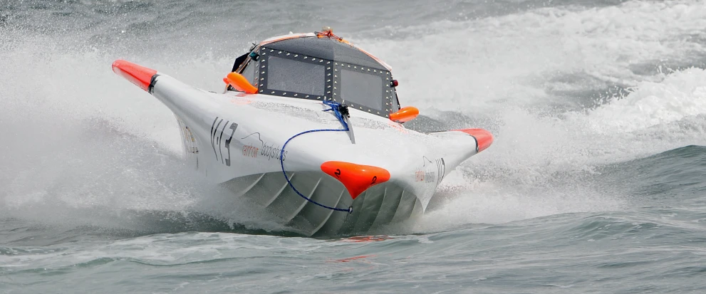 an inflatable boat in the middle of the ocean