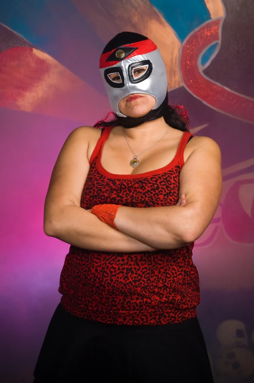 woman dressed up in wrestler outfit and mask