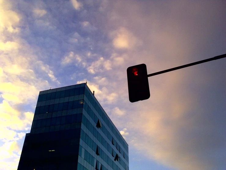 a stoplight at an intersection showing red