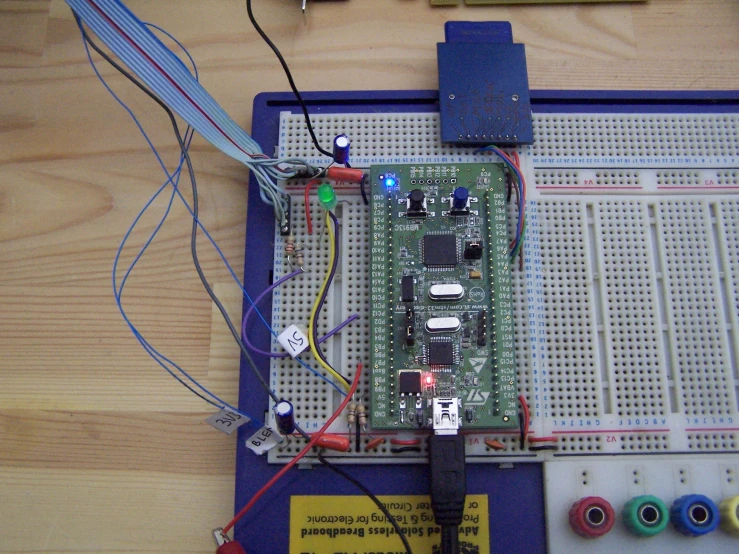 the electronic component is connected to several wires