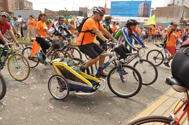 a group of bicyclist riding past each other