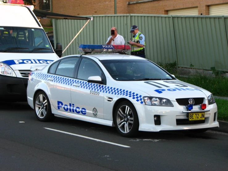 the police are attending to the van on the street