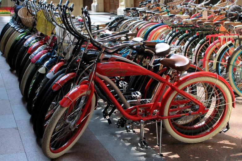 bicycles and bicycle parts lined up on display