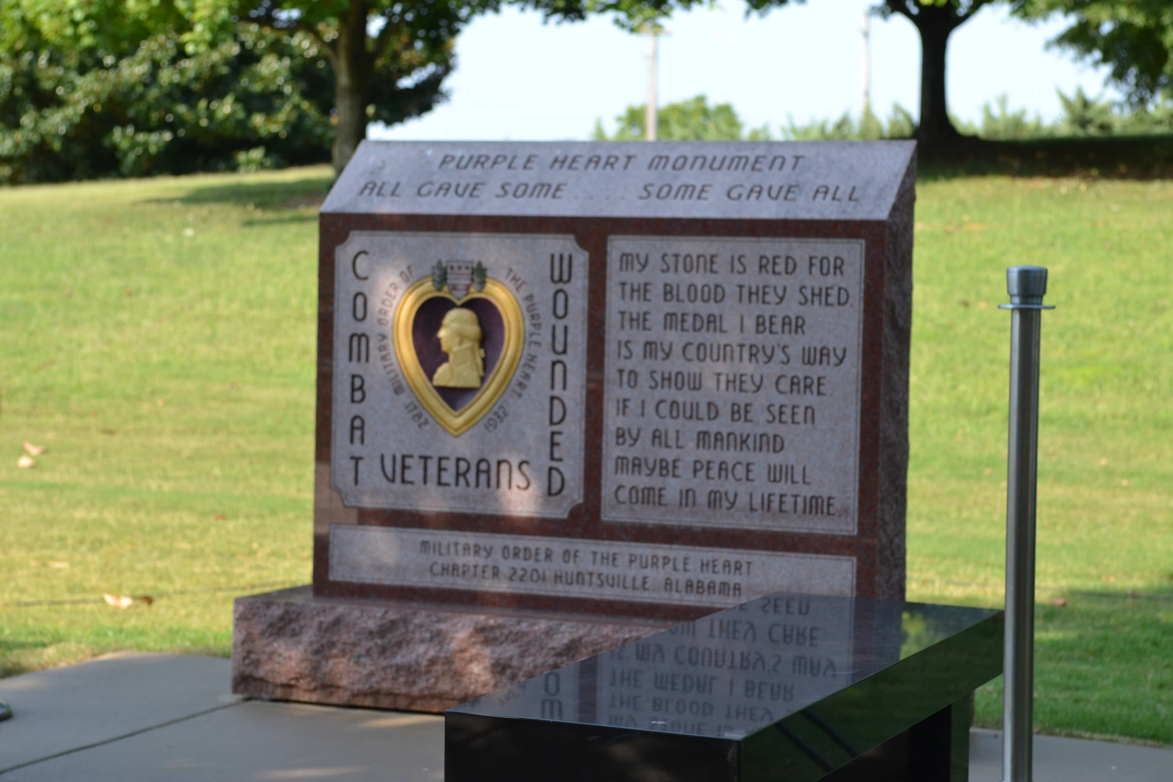 a memorial on the side of the street