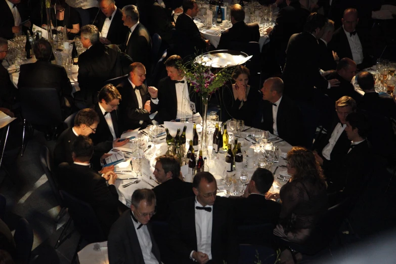 an overview of a large formal dinner