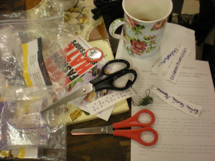 craft supplies including scissors, tags, papers and cups
