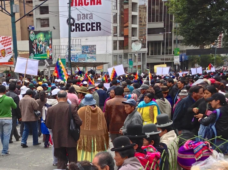 a crowd gathered at a street protest in mexico