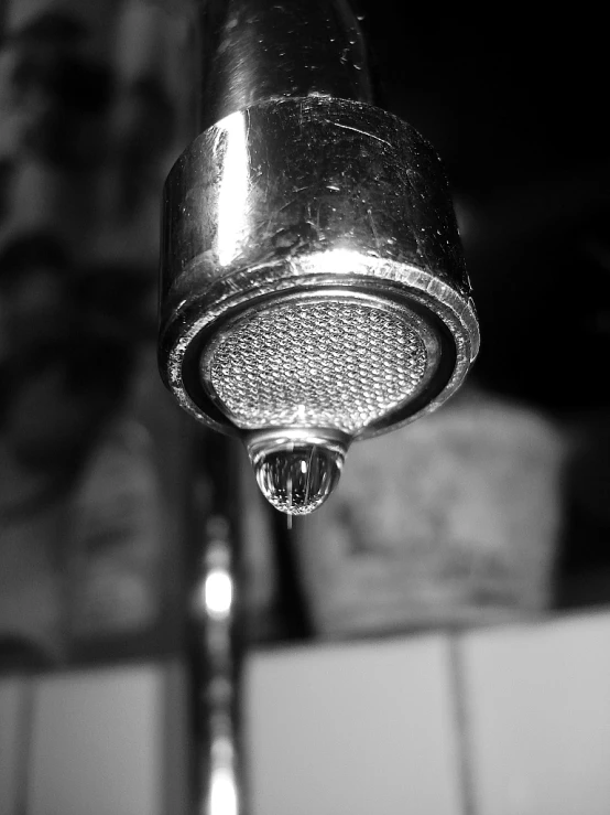 a faucet is pouring water out of it's spout