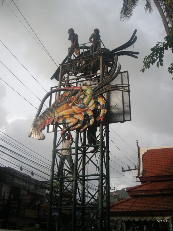 a group of people standing on top of a building