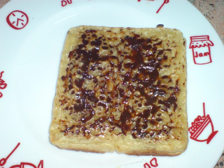 toast with toppings on a plate on a counter