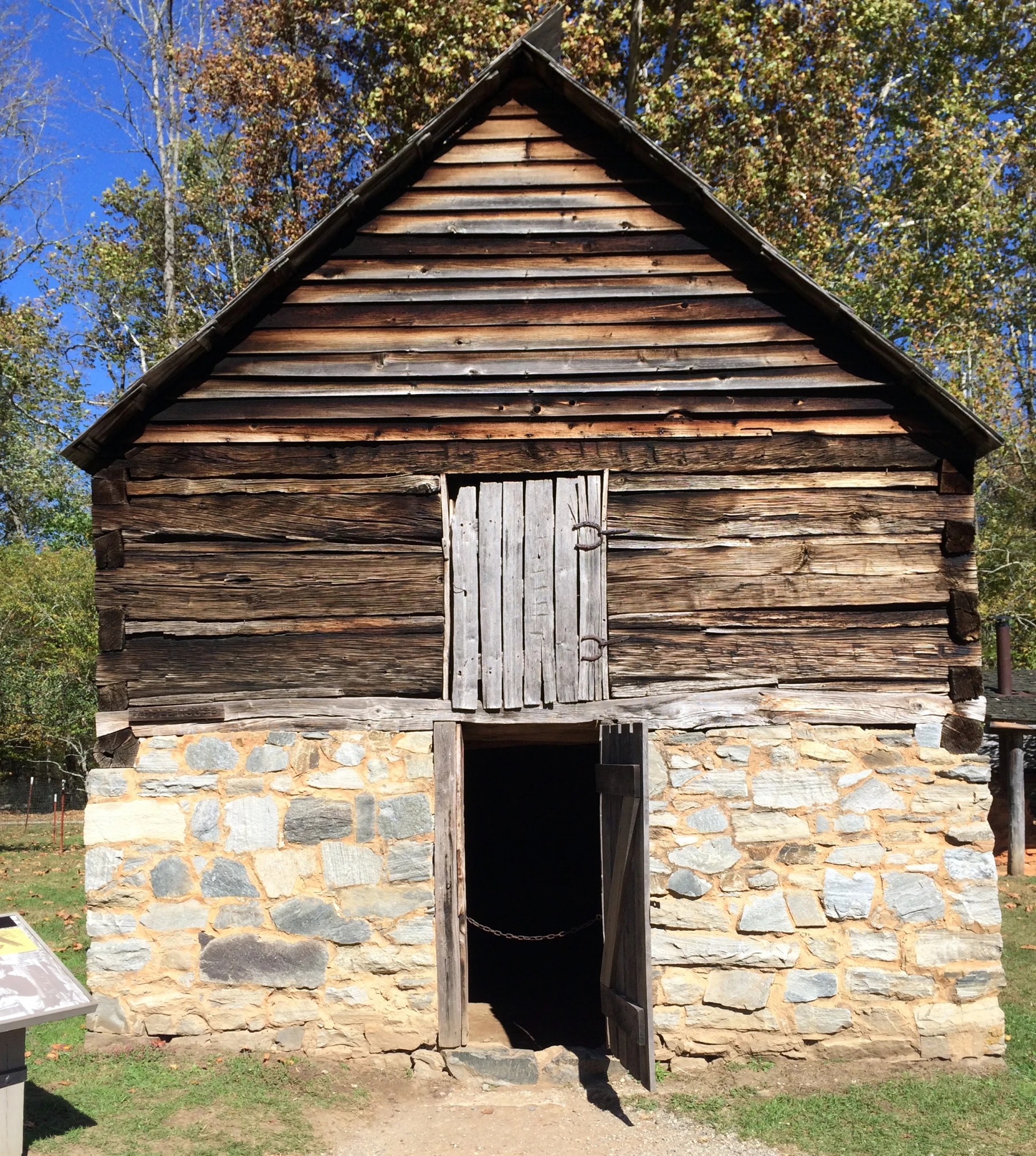 an old building with a black wooden door