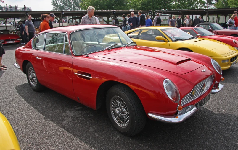 the antique car show is full of antique sports cars