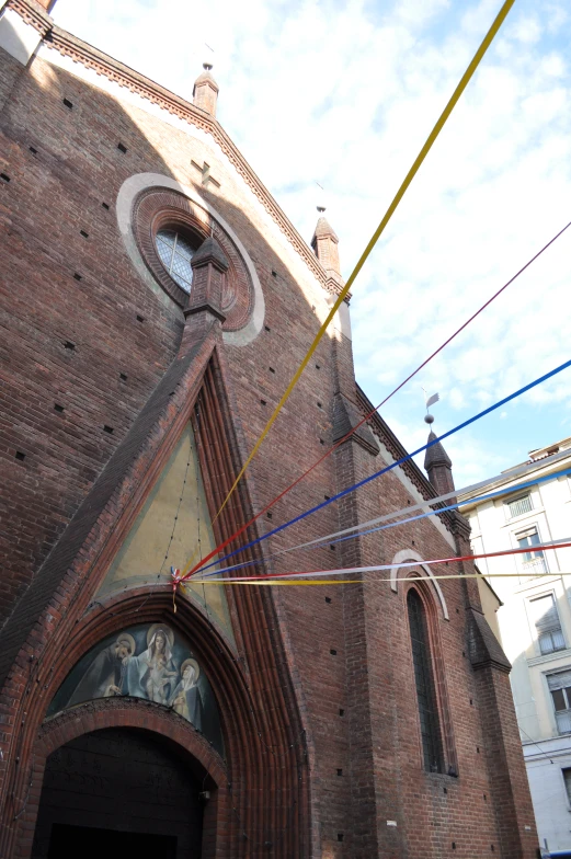 a church with some power lines over it