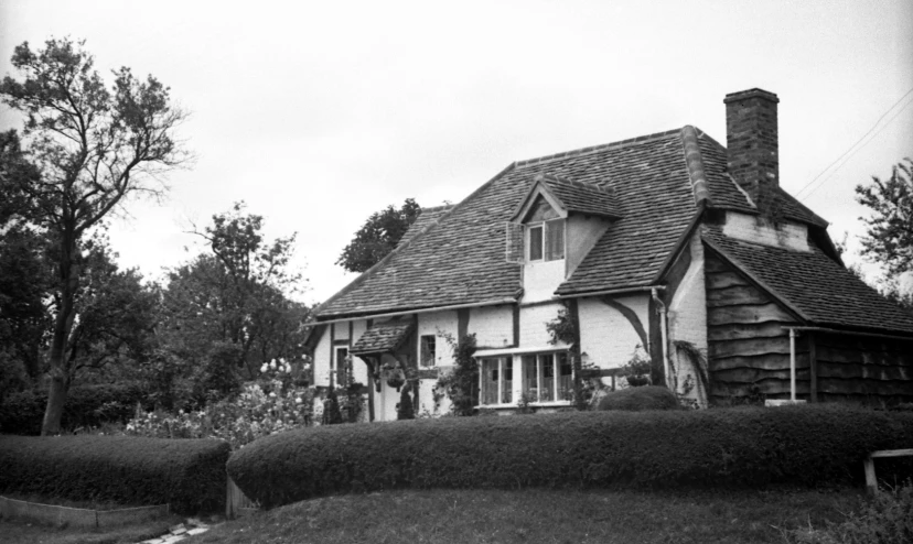 a house that has a chimney in the top of it