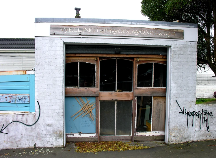 the doorway to a building in an alley