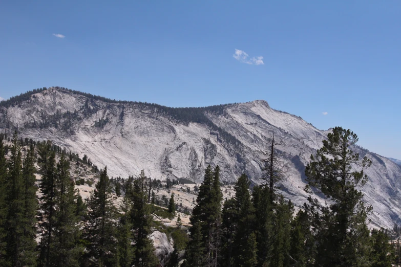 the view of a snow - capped mountain, from near the top