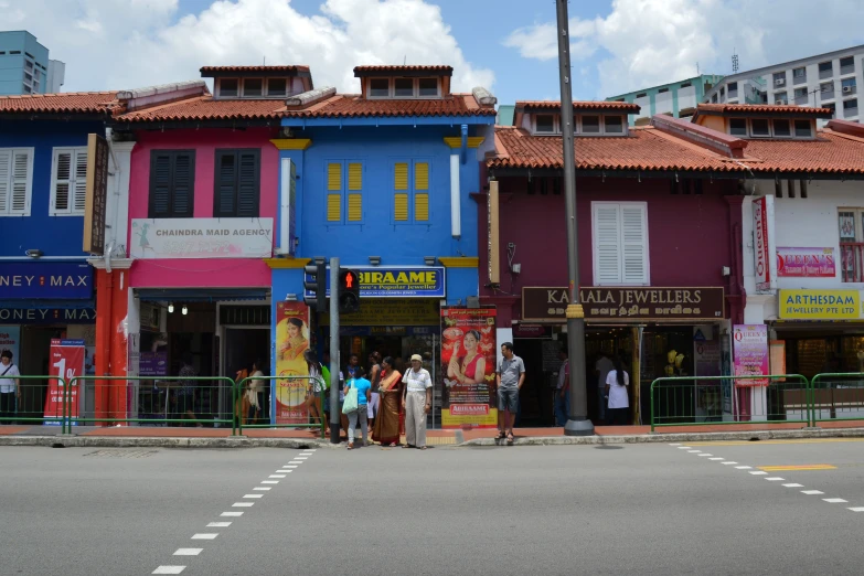 a row of colorful buildings near each other