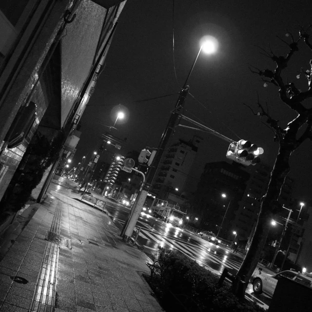 a long street lit up by traffic lights