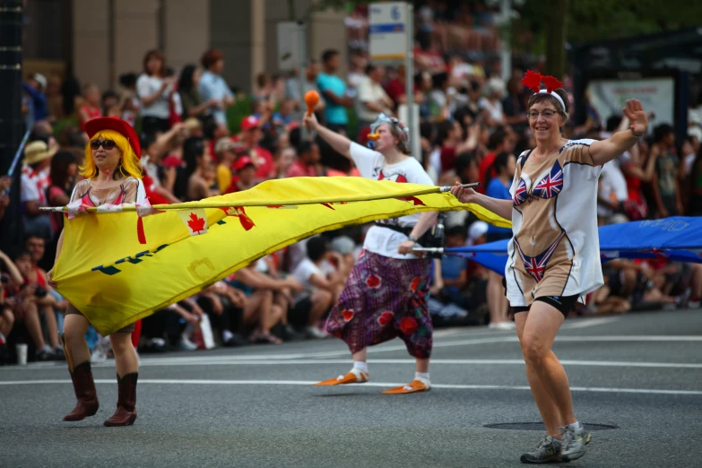 a group of people riding down the street