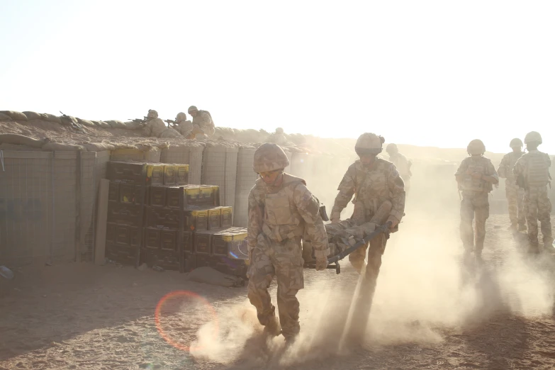 two soldiers with a broken leg carry a parasol