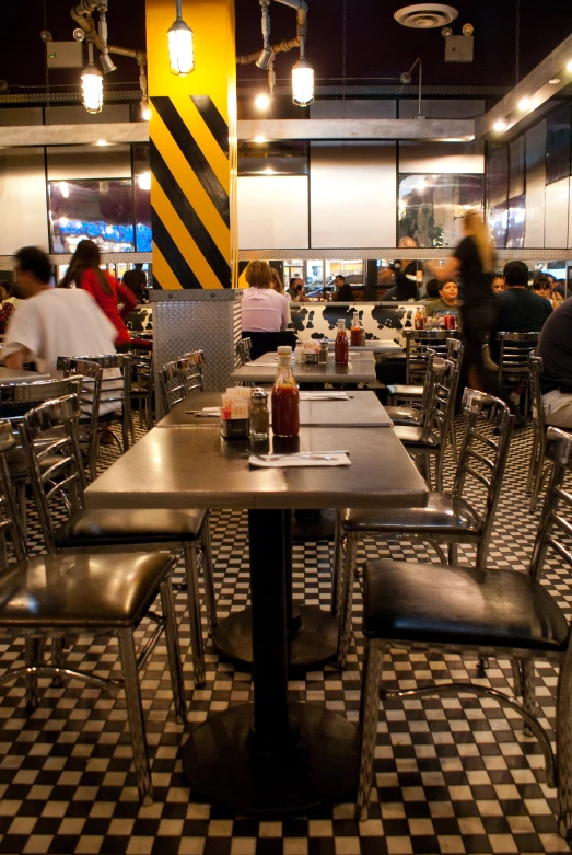 restaurant tables are set up in order to get customers