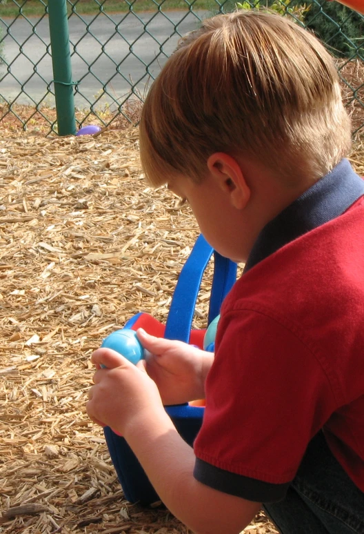 the  is playing with his toys