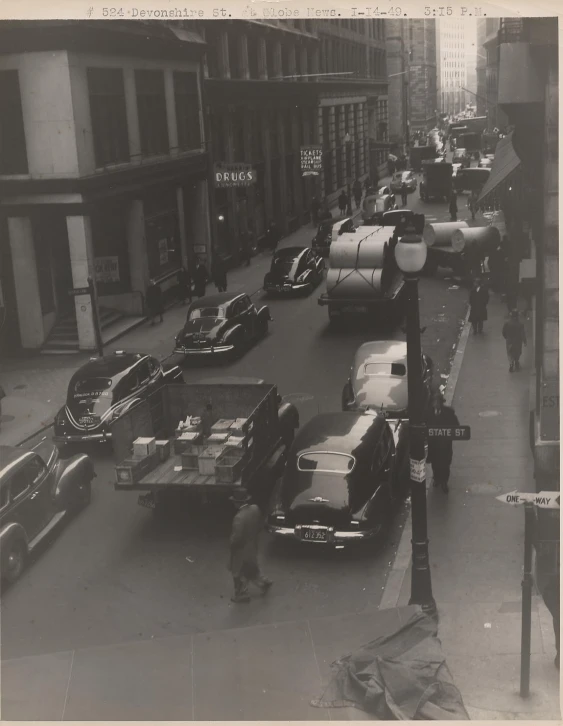 a black and white image of a crowded street