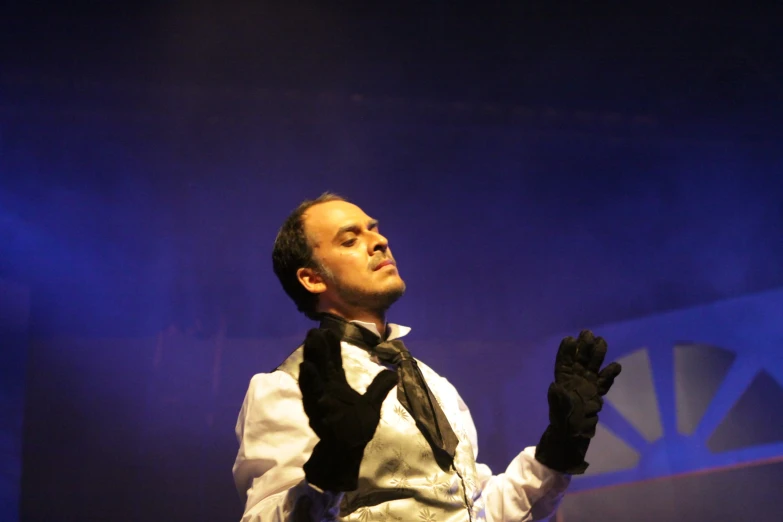 a man with a white shirt and black tie