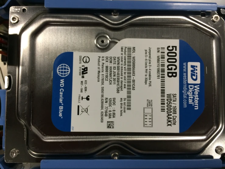 hard drive with its tags and hardware attached